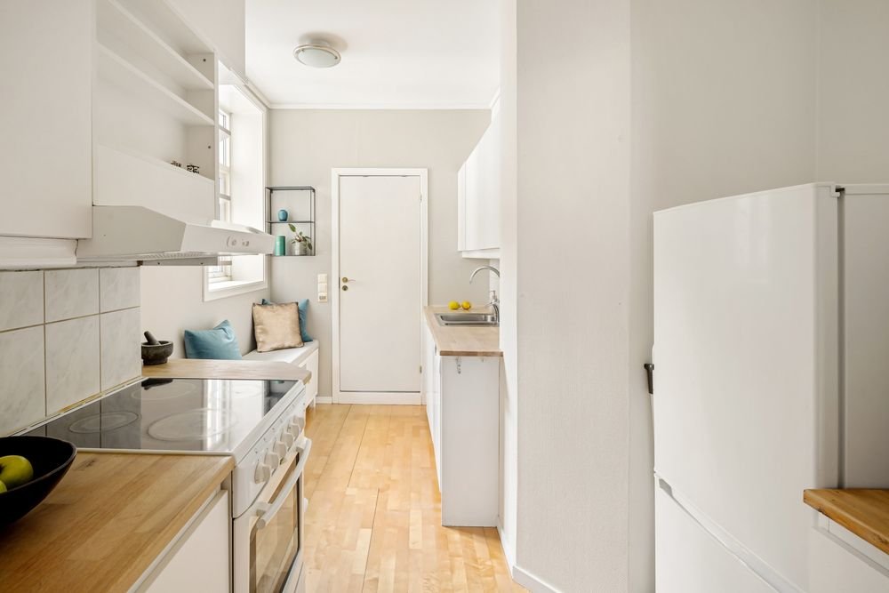 Bright, clean apartment kitchen in Lisbon